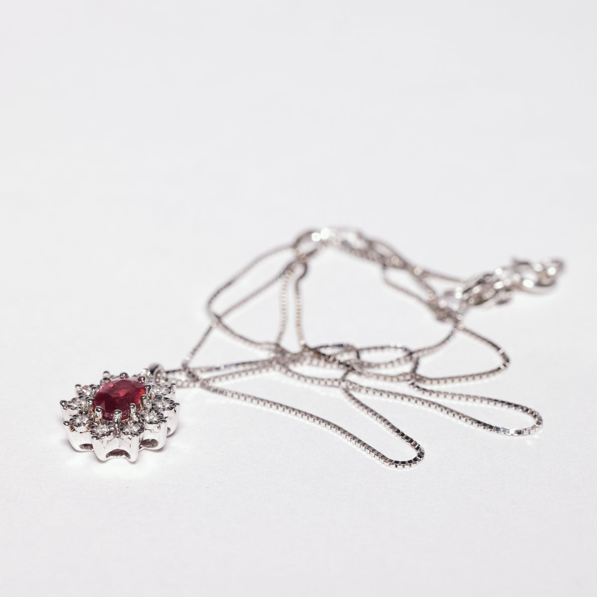 Pendant with central Ruby and Diamonds in a Star setting