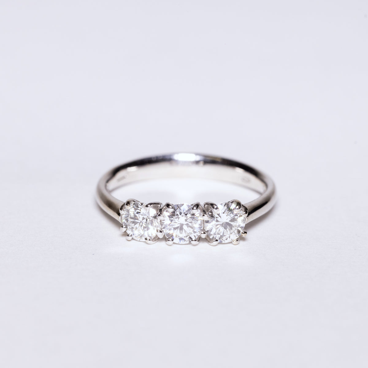 18KT White Gold Trilogy Ring With Round Brilliant Cut Diamonds