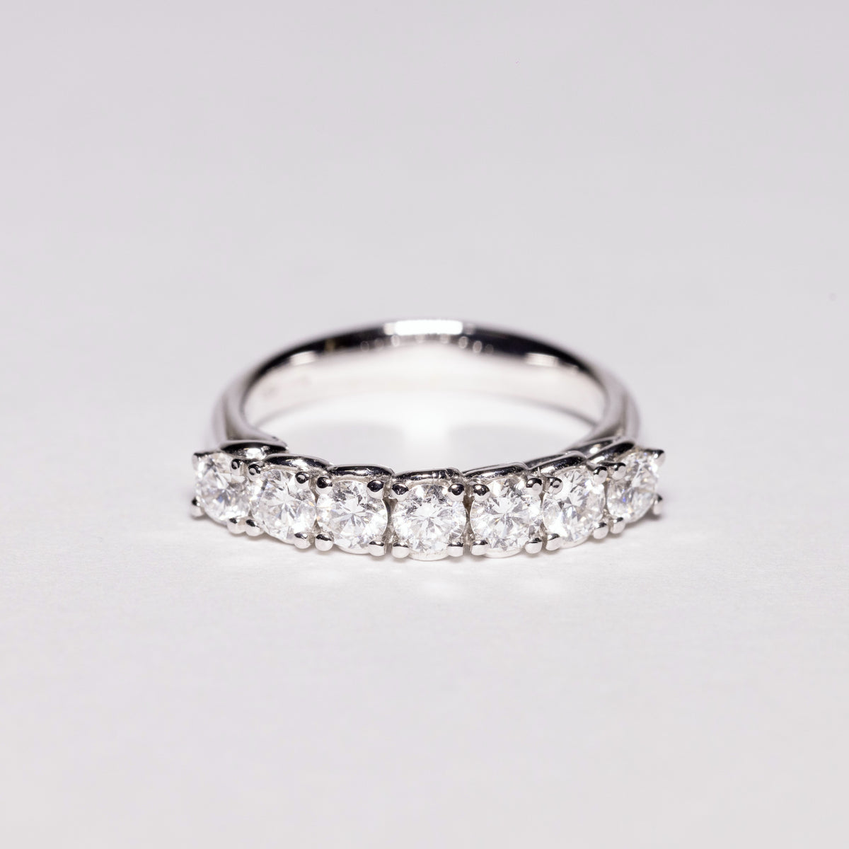 18KT White Gold Veretta Ring with 7 Round Brilliant Cut Diamonds