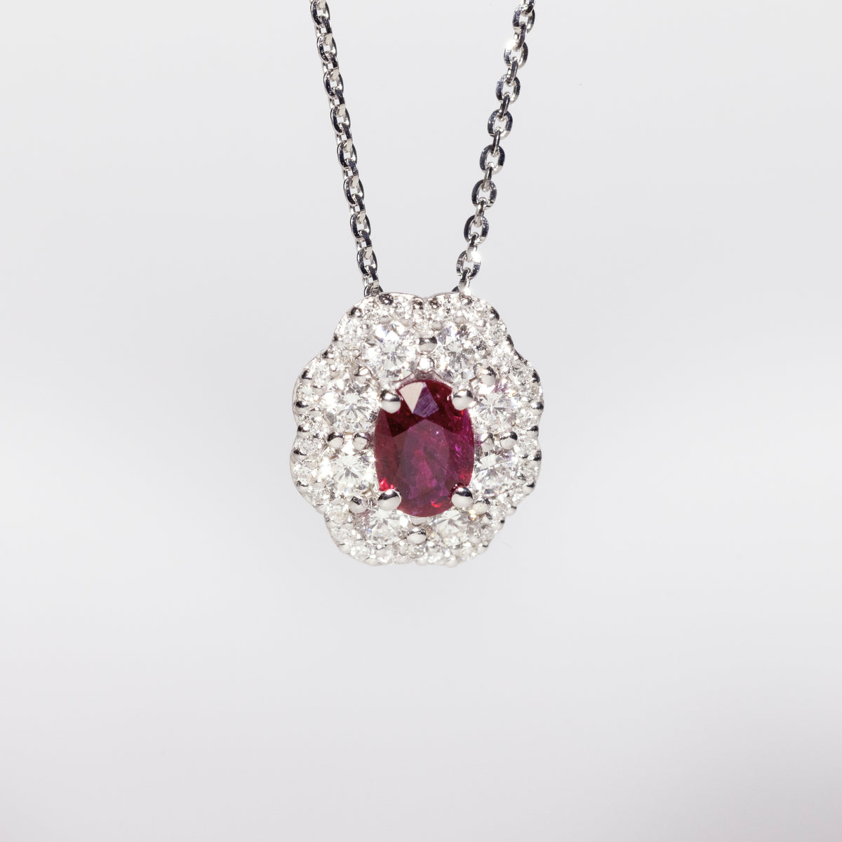 18KT White Gold Necklace With Central Ruby and Double Row of Flower-Shaped Diamonds