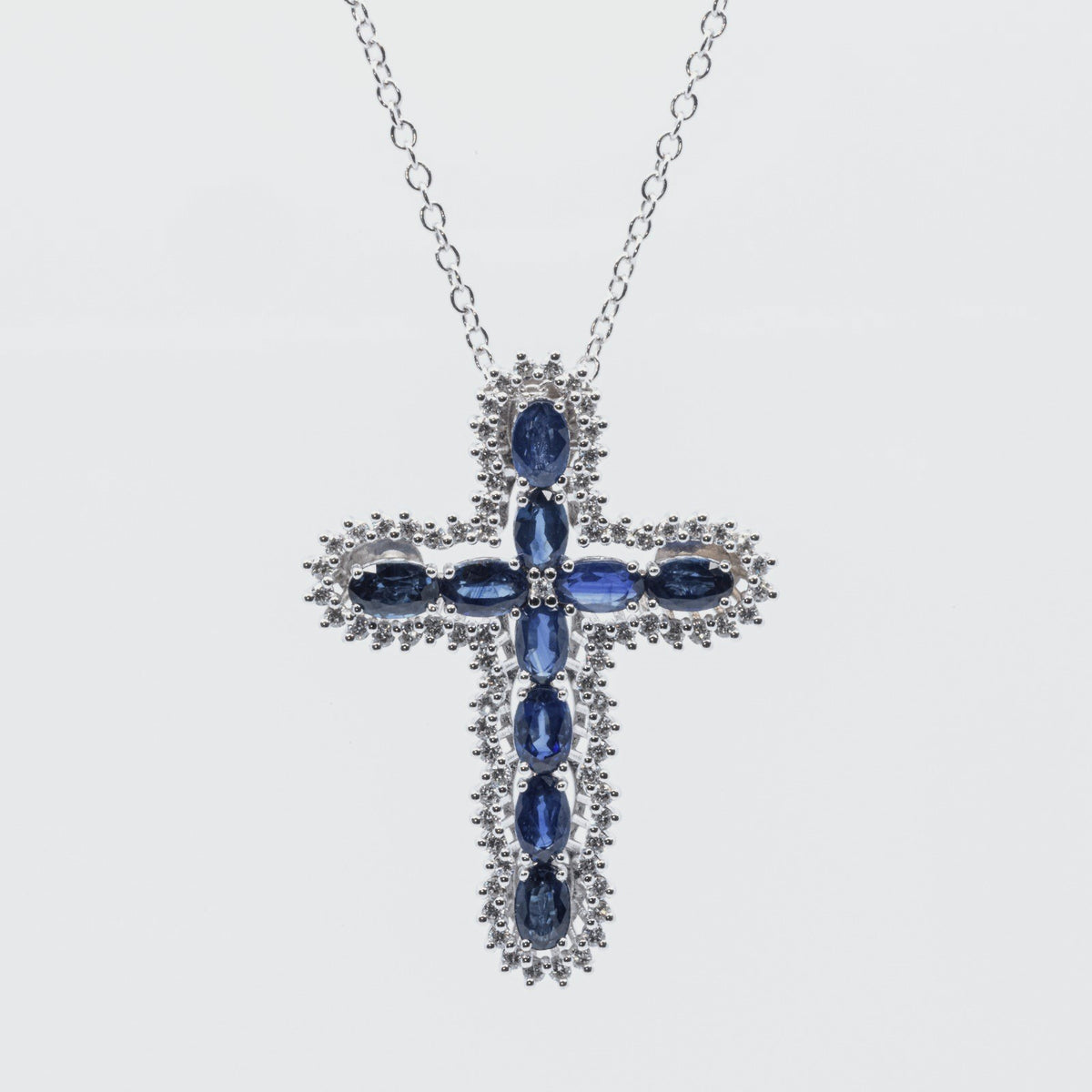 Precious Cross Necklace with Diamonds and Sapphires in 18 kt White Gold