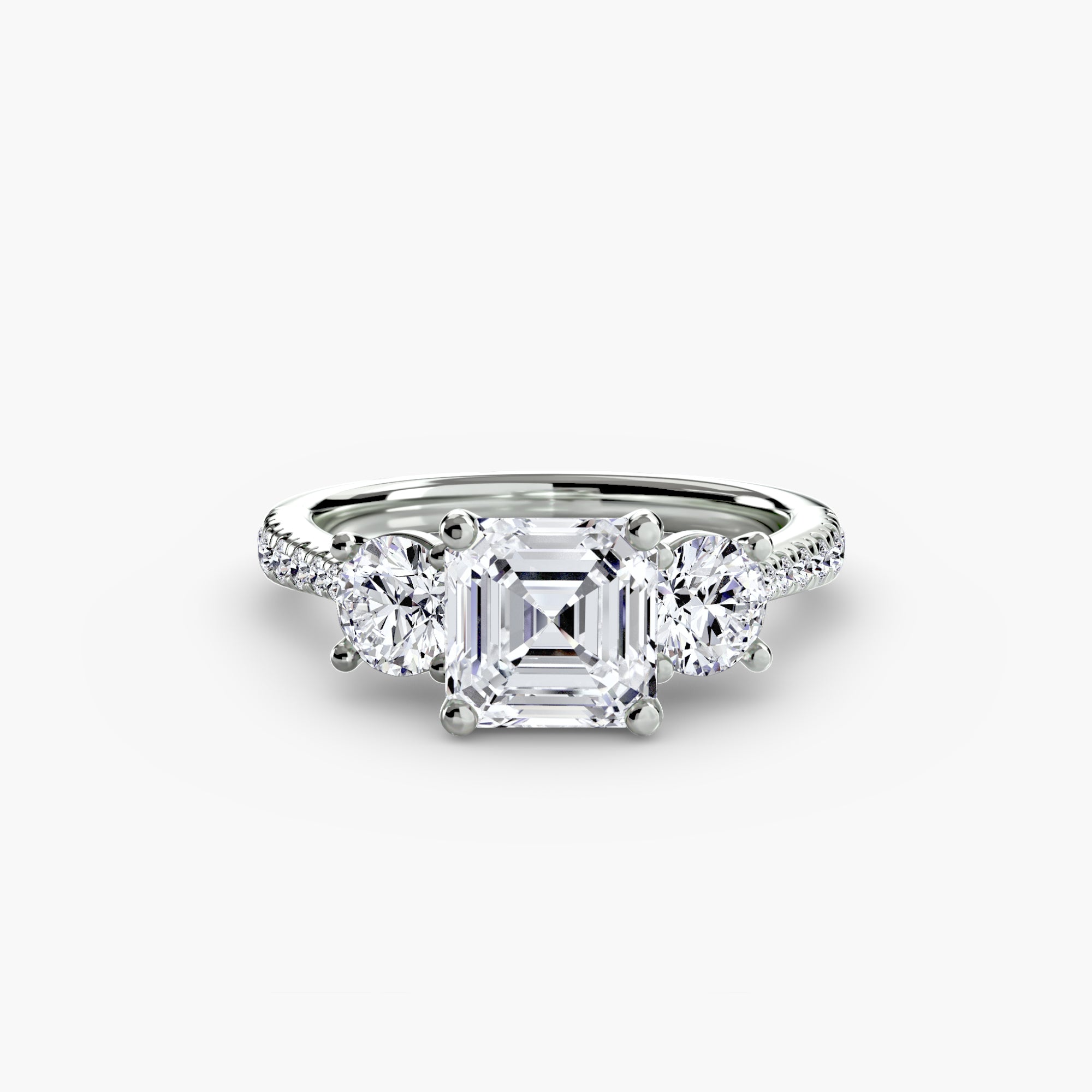 Anello con Tre Pietre e Fascia Pavé