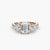 Anello con Tre Pietre e Fascia Pavé