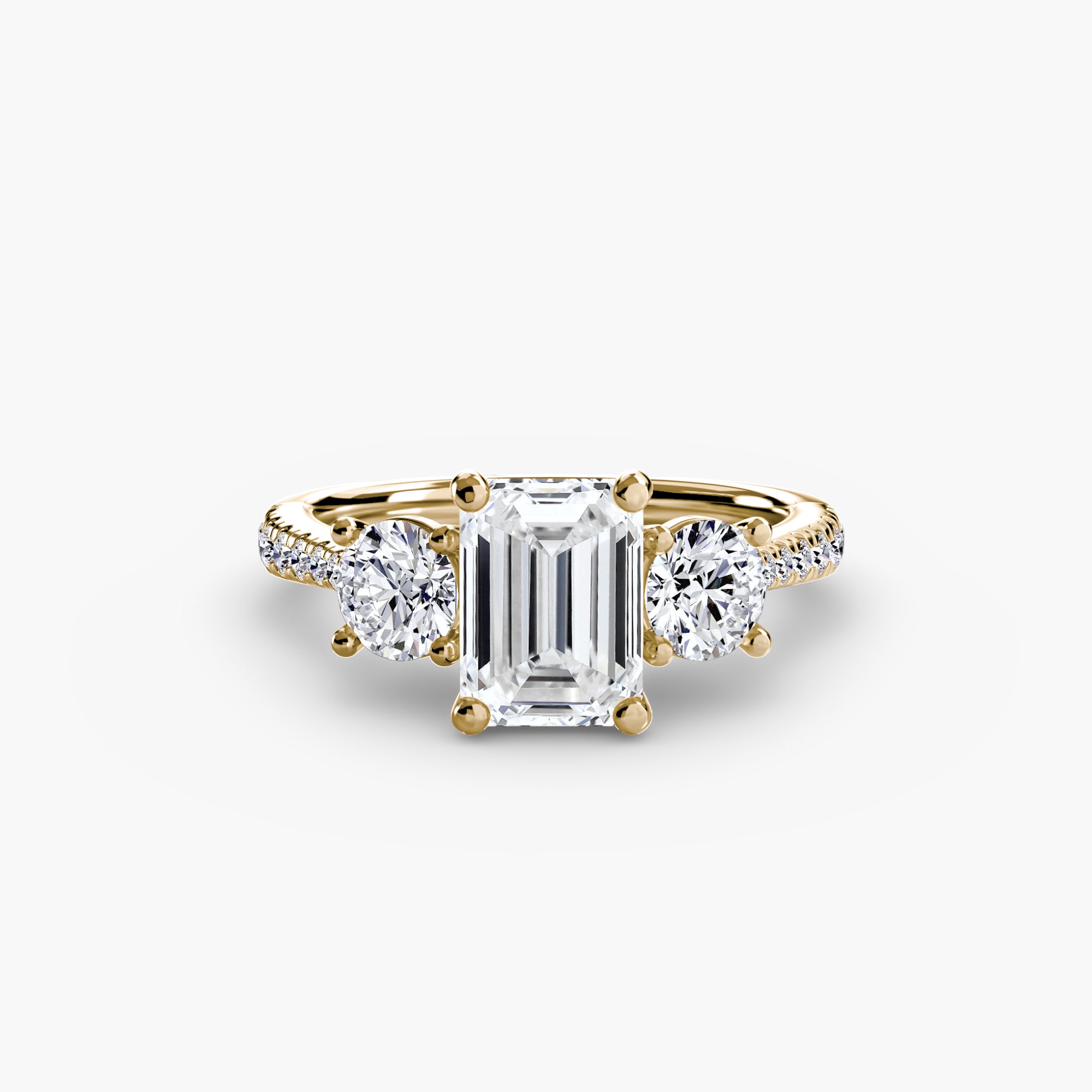 Anello con Tre Pietre e Fascia Pavé