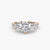 Anello con Tre Pietre e Fascia Pavé