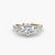 Anello con Tre Pietre e Fascia Pavé