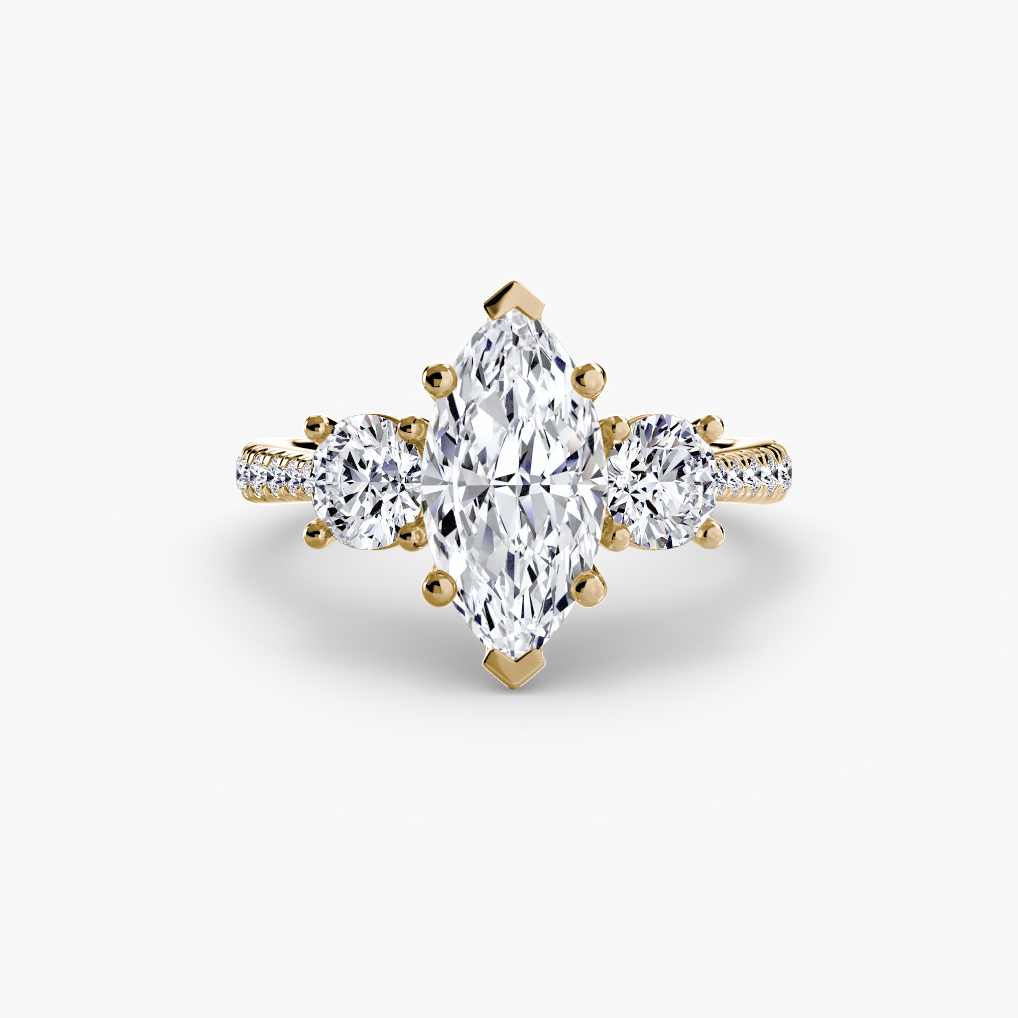 Anello con Tre Pietre e Fascia Pavé