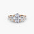 Anello con Tre Pietre e Fascia Pavé