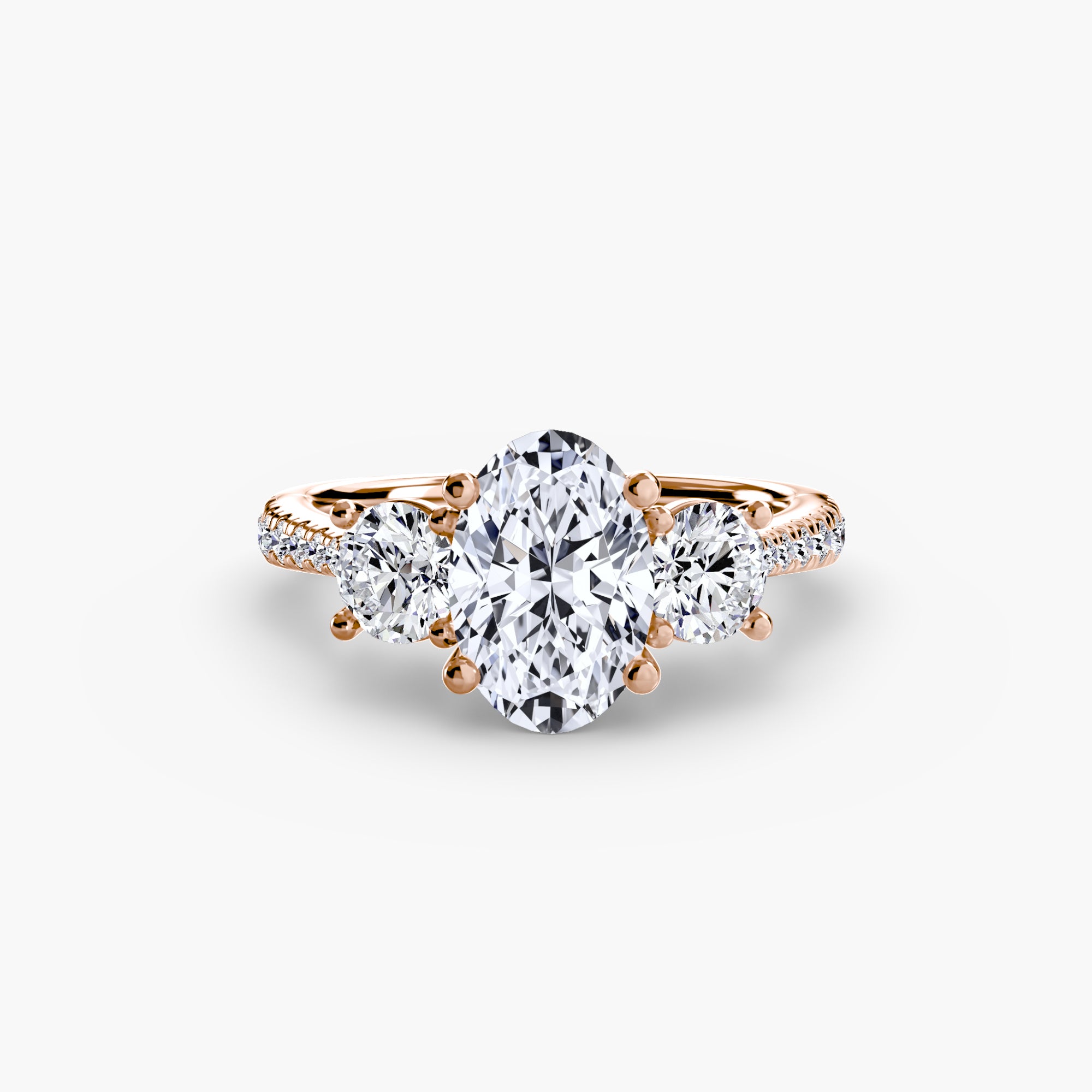 Anello con Tre Pietre e Fascia Pavé