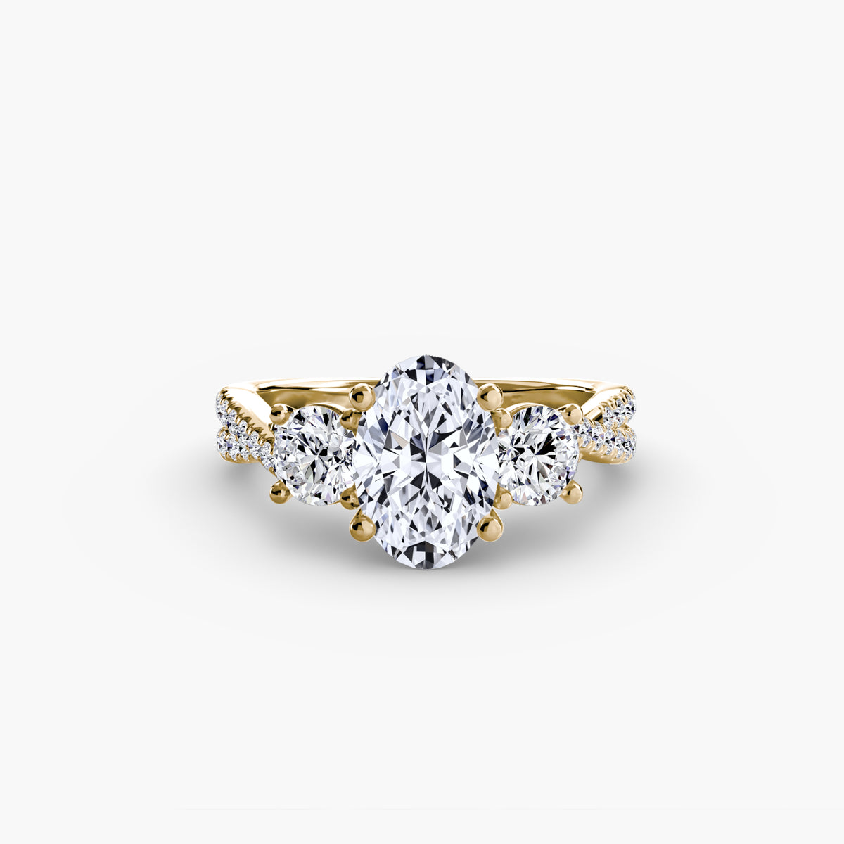 Anello con Tre Pietre e Fascia Pavé 2
