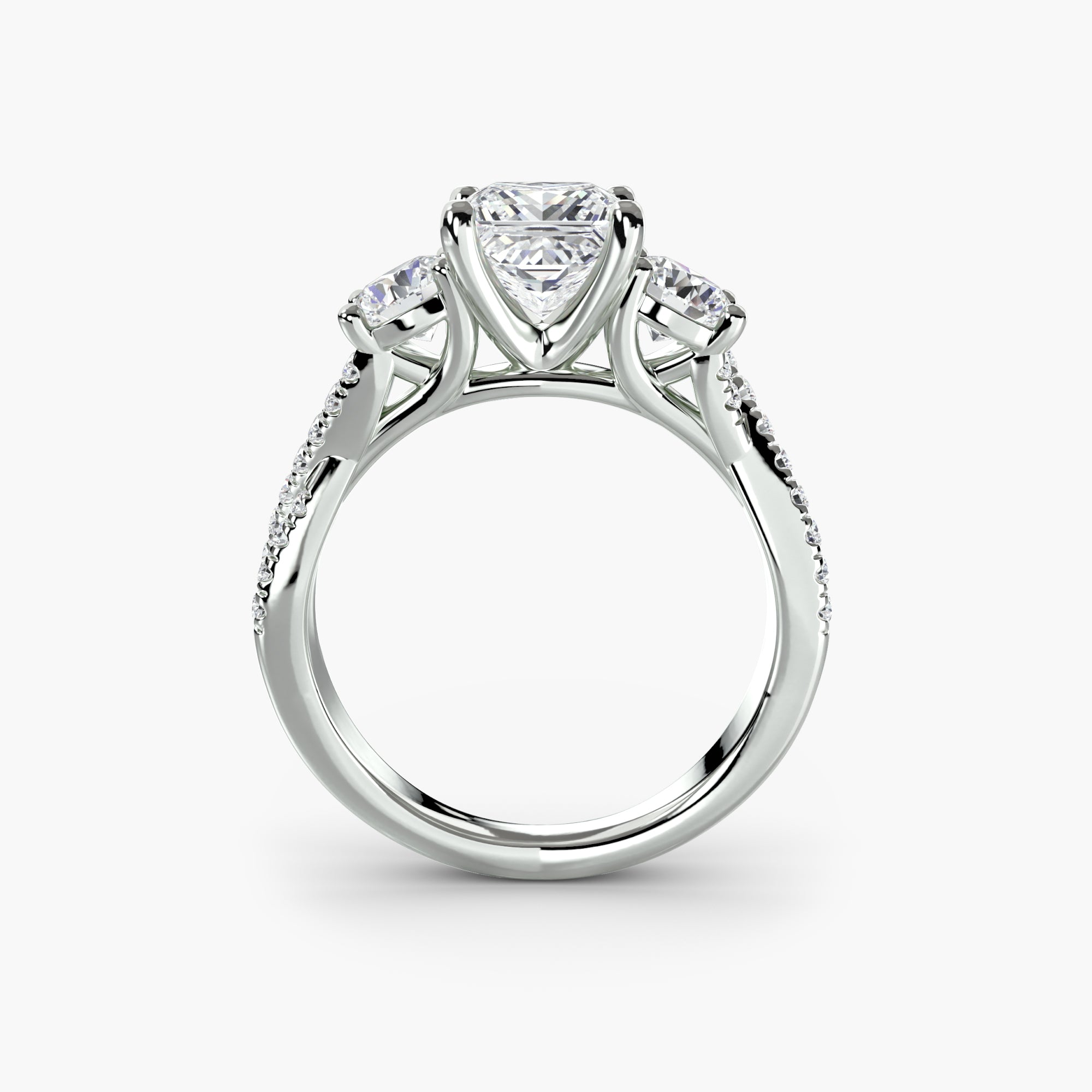 Anello con Tre Pietre e Fascia Pavé 2