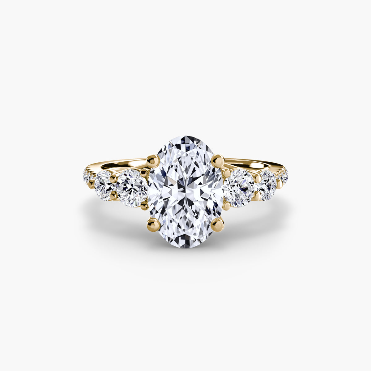 Anello con Cinque Pietre e Fascia Pavé