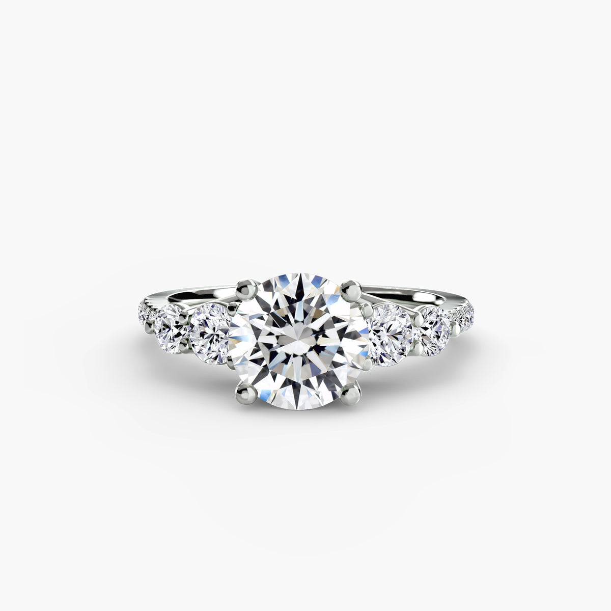 Anello con Cinque Pietre e Fascia Pavé