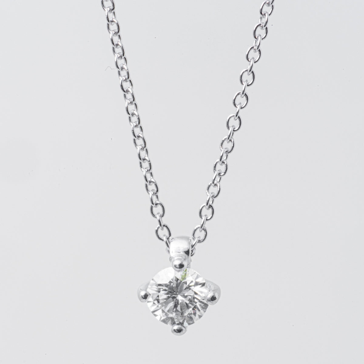 Platinum diamond point light necklace