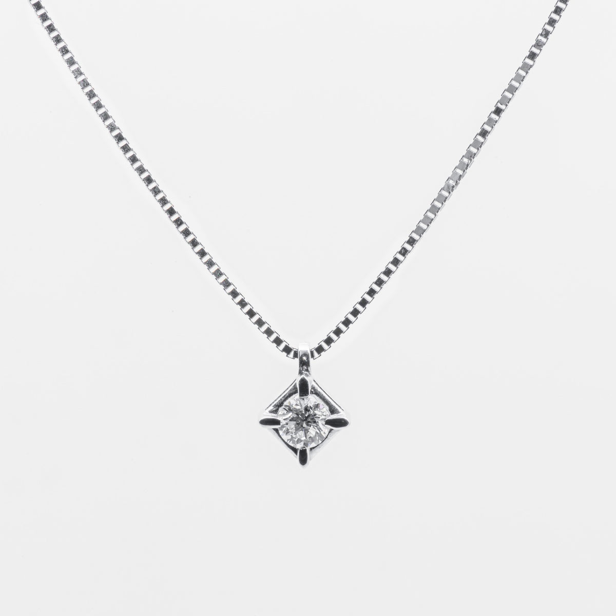 Collier punto luce con diamante in oro bianco 18 kt