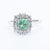 Anello in Oro Bianco 18KT  con Smeraldo da 0,88 kt e contorno con diamanti da 0,79kt