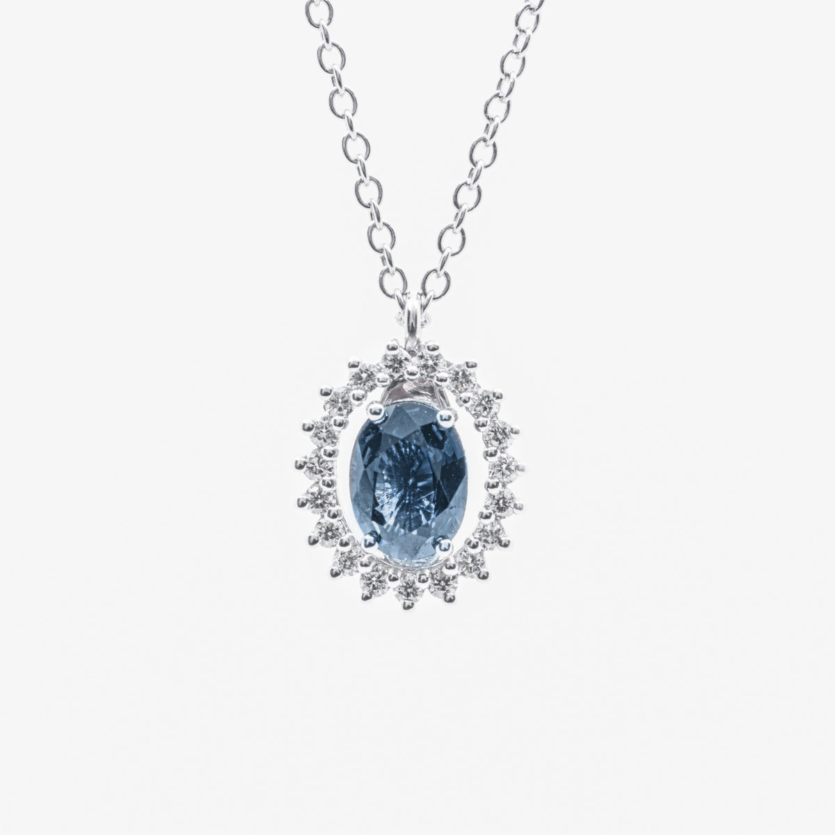 Central Sapphire Necklace Surrounded by Diamonds in 18kt White Gold
