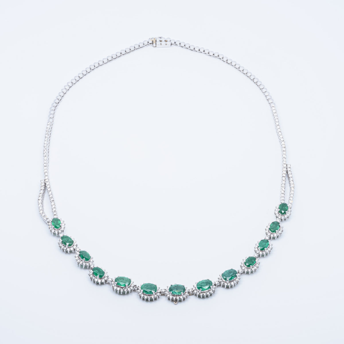 Emerald Necklace Surrounded by Diamonds in 18kt White Gold