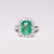 Anello in Oro Bianco 18 KT con Smeraldo Taglio Emerald e Giro di Diamanti