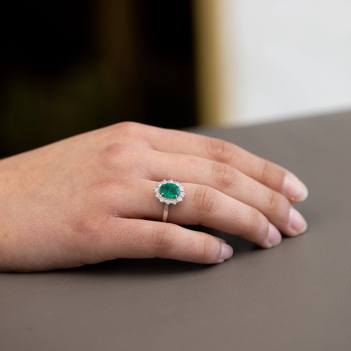 Emerald Ring 1.98 ct Surrounded by Diamonds 0.48 ct in 18 kt White Gold