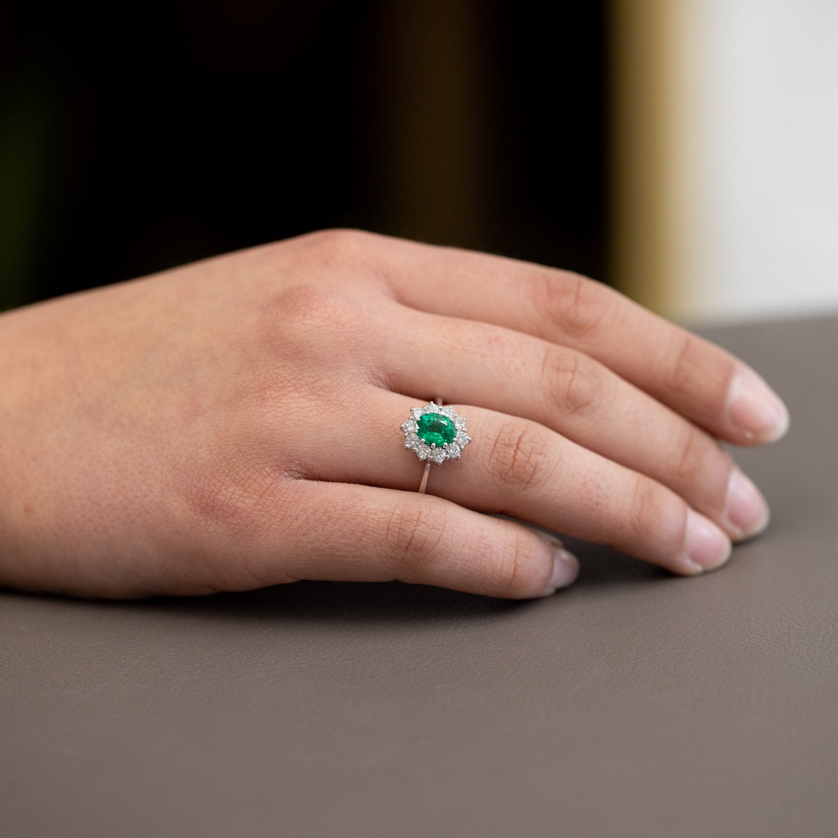 Emerald Ring 1.21 ct Surrounded by Diamonds 0.82 ct in 18 kt White Gold