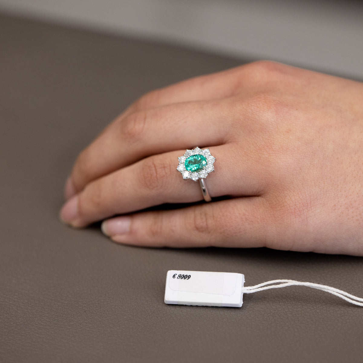 Emerald Ring 1.28 ct Surrounded by Diamonds 1.08 ct in 18 kt White Gold