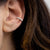 Conch earring in oro bianco 18 kt con diamanti