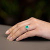 Anello in oro bianco 18kt con Smeraldo da 1,66 ct Contornato in Diamanti taglio carrè
