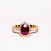 Anello in oro rosa 18kt contornato in diamanti e rubino ovale da 2,35kt