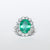 Anello in Oro Bianco 18KT con Smeraldo da 4,50 carati e contorno Diamanti