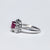 Anello in Oro Bianco 18 KT con Rubino Centrale e Giro di Diamanti