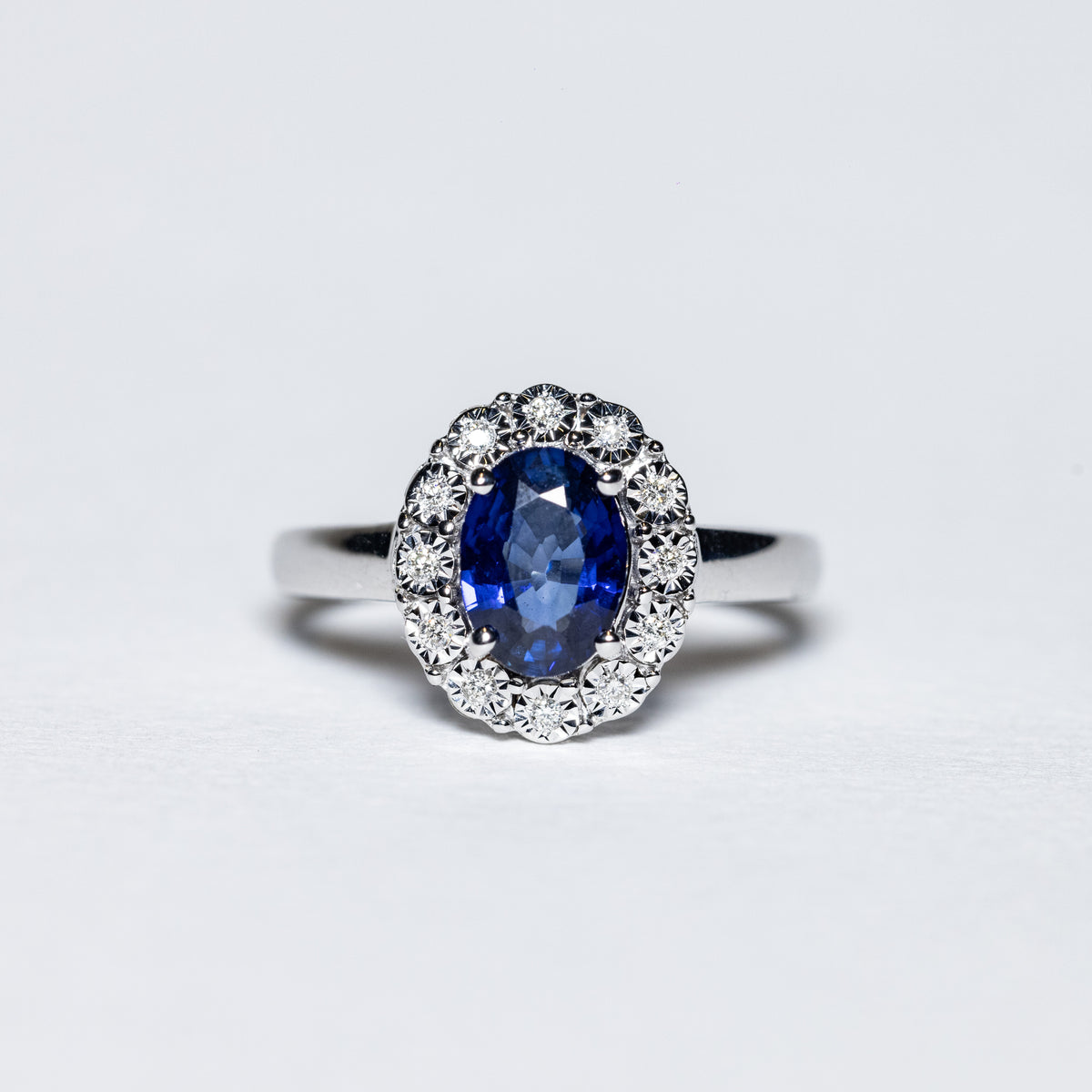 18KT White Gold Ring with Oval Cut Sapphire and Diamond Ring