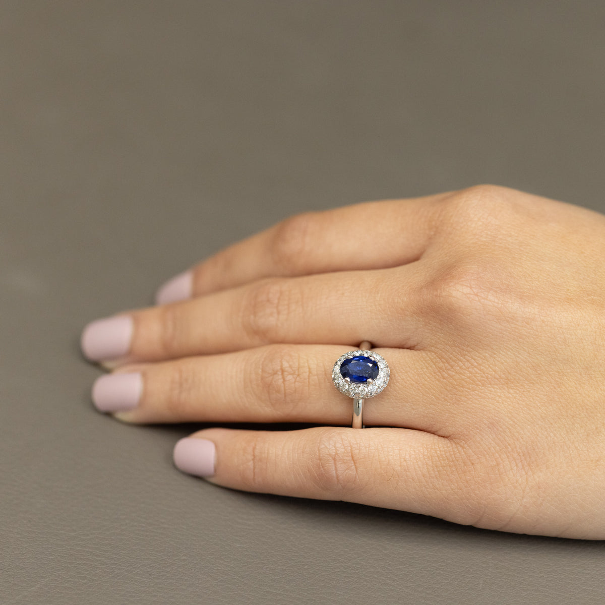 18 KT White Gold Ring with Central Sapphire and Double Row of Diamonds