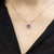 Collana in Oro Bianco 18 Kt Forma a Cuore Pave' con Doppio Giro di Diamanti e Rubino Centrale