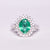 Anello in Oro bianco con Smeraldo centrale e doppio giro in diamanti