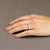 Anello Trilogy in Oro Bianco 18 Kt con Montatura a Sei Griffe