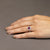 Anello in Oro Bianco 18 Kt con Rubino Centrale con Giro di Diamanti