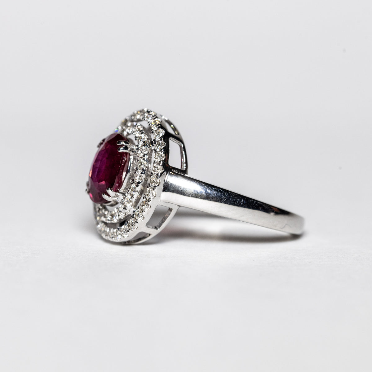 18K White Gold Ring with Central Ruby and Double Row of Diamonds