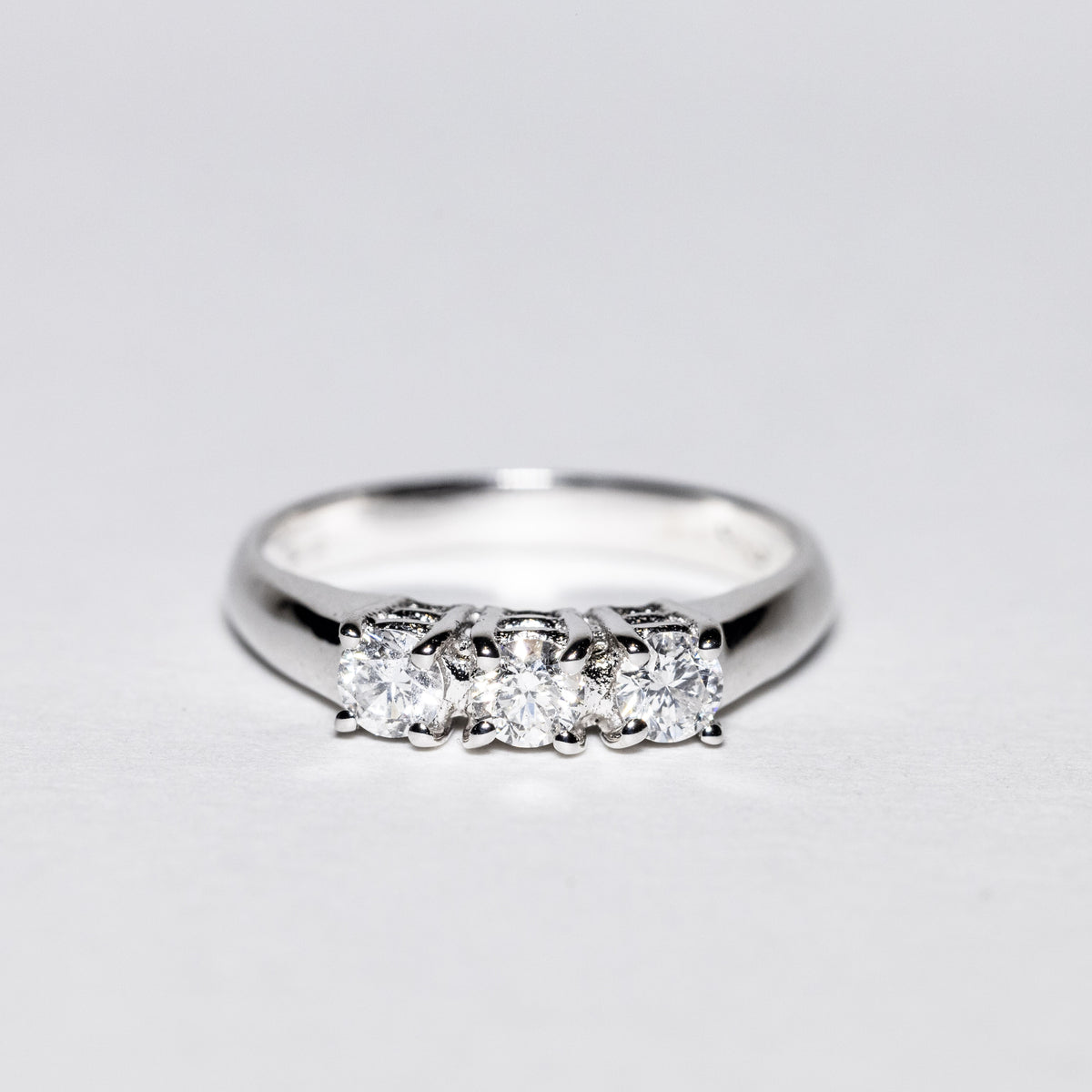 18K White Gold Trilogy Ring with Four Prong Setting