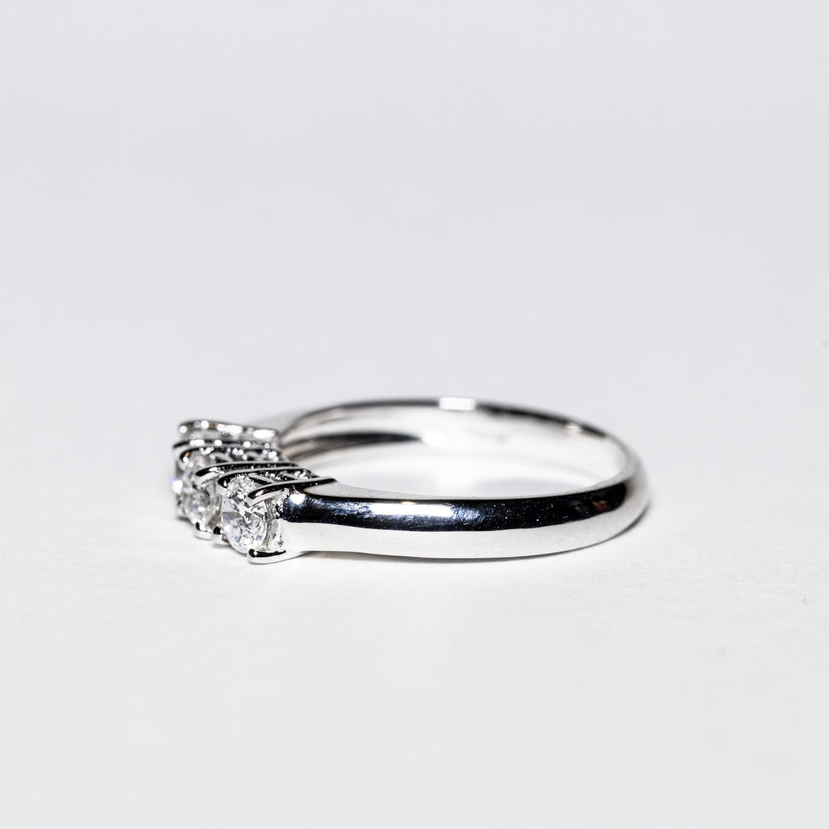 18K White Gold Trilogy Ring with Four Prong Setting