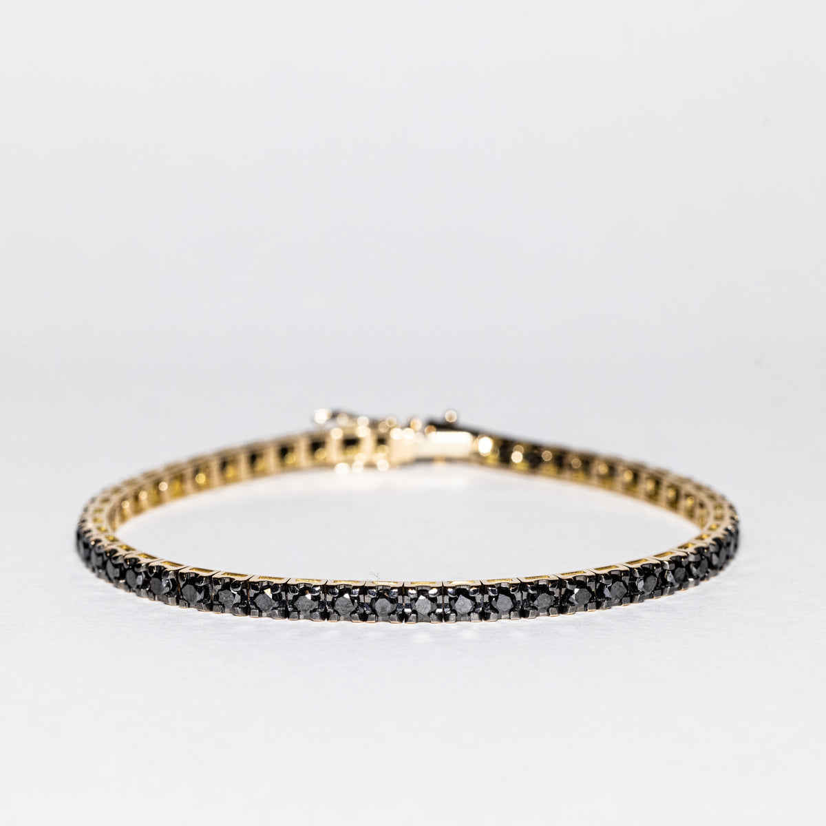 Bracciale Tennis in Oro Giallo 18 Kt con Diamanti Neri