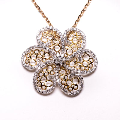 Collier Essence in oro bianco e giallo 18 kt con petali in diamanti e oro a forma cerchiata (creazione unica)