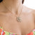 Collier Essence in oro bianco e giallo 18 kt con petali in diamanti e oro a forma cerchiata (creazione unica)