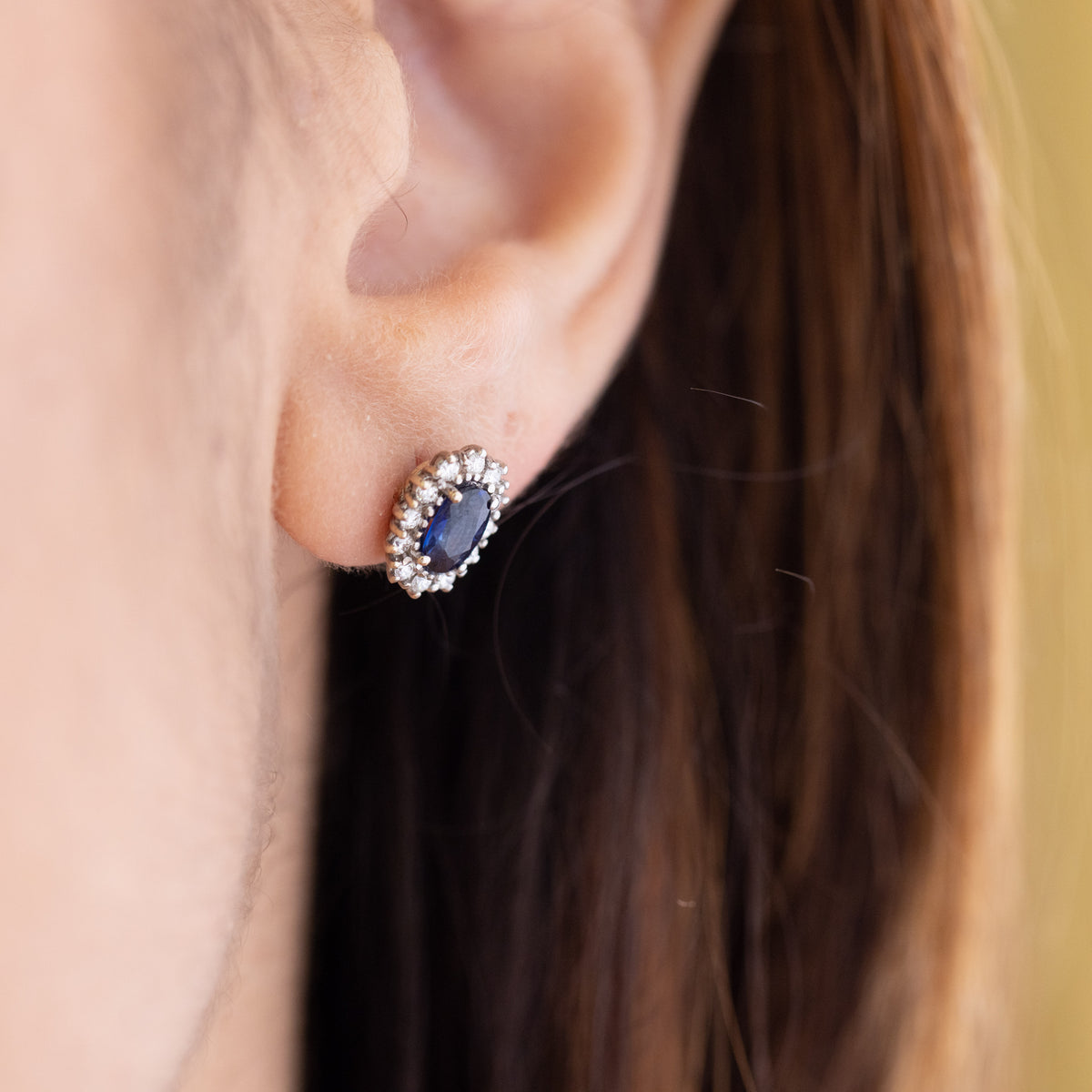 18kt white gold earrings with sapphires surrounded by diamonds