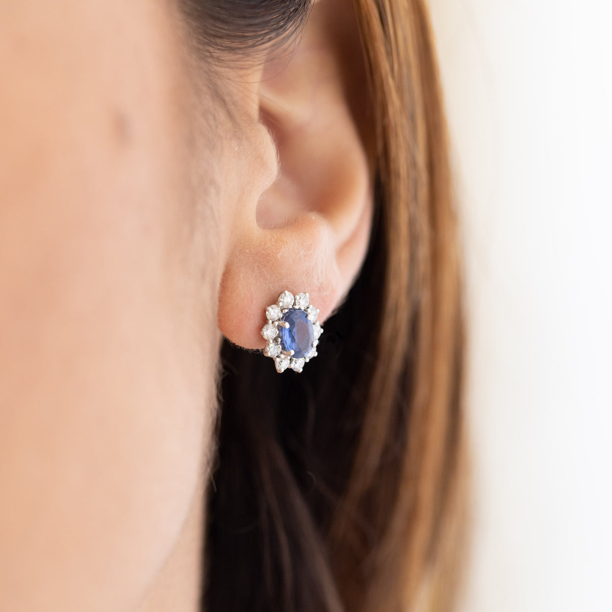 18kt white gold earrings with sapphires surrounded by diamonds