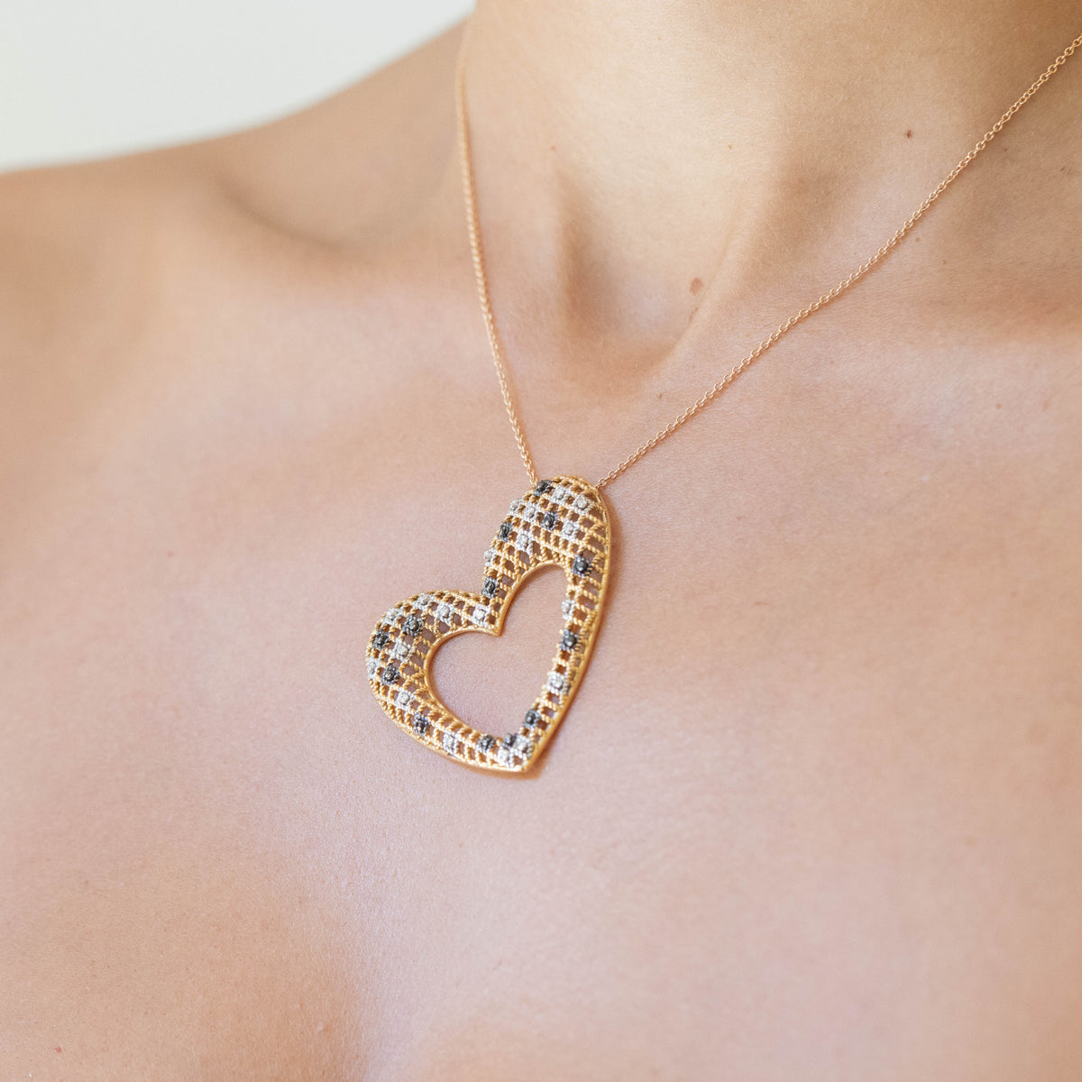 18k Yellow Gold Heart Shape Necklace with White and Black Diamonds