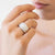 Anello Fascia in Oro Bianco 18KT con Diamanti centrali Taglio Baguette e Diamanti laterali Taglio Rotondo Brillante