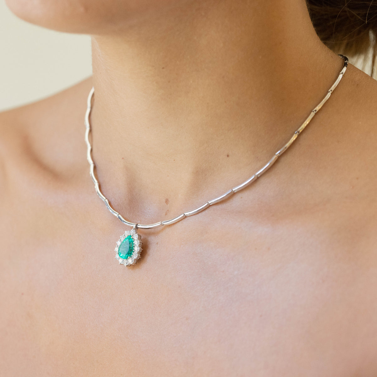 18kt White Gold Emerald Drop Pendant Necklace with Diamond Surround