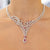 Collana Collier Luminarie in Oro Bianco 18KT con pendente in Rubino Taglio Goccia, Rubini rotondo brillanti sparsi e Diamanti