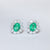 Orecchini in Oro Bianco 18KT con Smeraldi Taglio Ovale e contorni in Diamanti